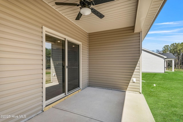 view of patio featuring a ceiling fan