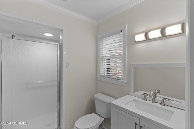 bathroom featuring vanity, toilet, crown molding, and an enclosed shower