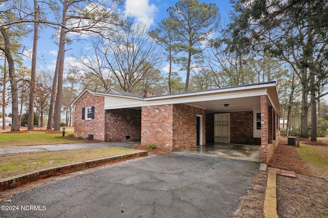 view of front of house with a carport