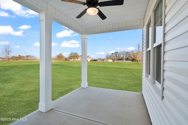 view of patio featuring a ceiling fan