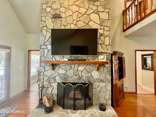 interior details with hardwood / wood-style flooring and a fireplace