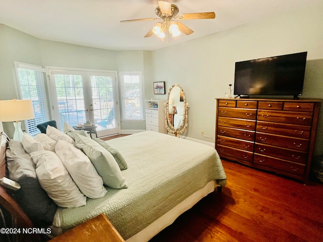 bedroom with dark wood-type flooring, french doors, and ceiling fan