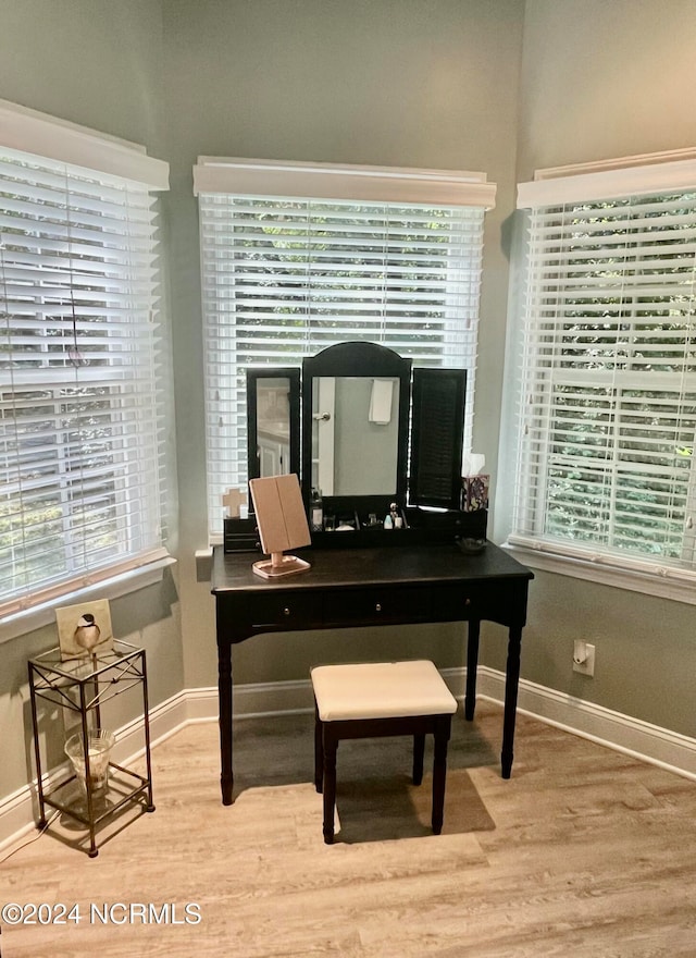 home office with light wood-type flooring