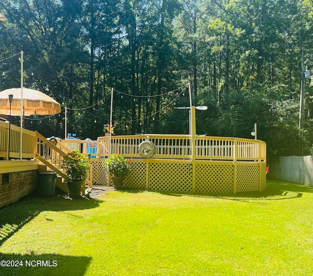 view of yard featuring a deck