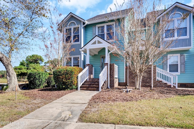 view of front facade with a front lawn