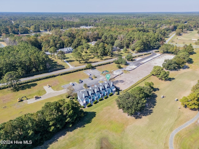 aerial view with a wooded view