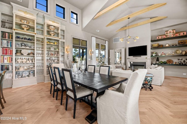 dining room featuring light parquet floors, high vaulted ceiling, and plenty of natural light