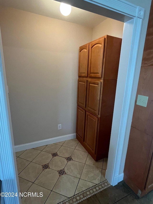 bathroom with tile patterned flooring