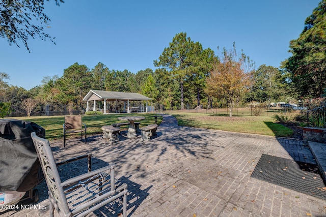 exterior space featuring a gazebo and area for grilling