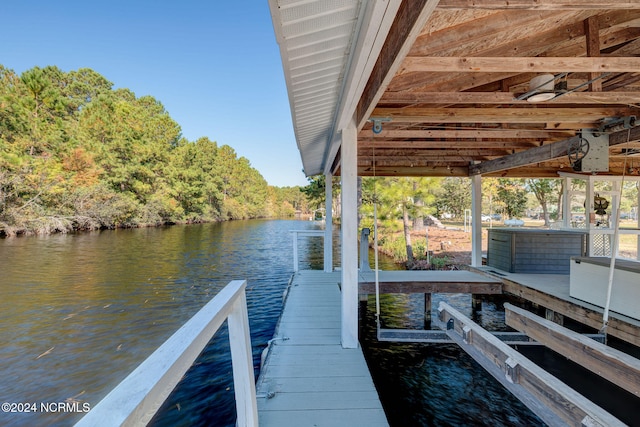 view of dock with a water view