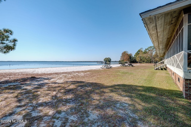 view of water feature with a beach view