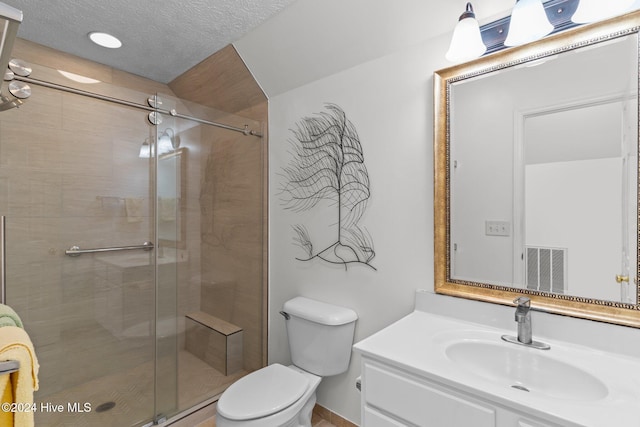 7319 Thurgood Rd, Wilmington, NC 28411 - bathroom featuring vanity, toilet, and a stall shower