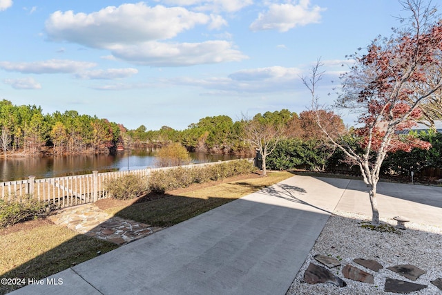 7319 Thurgood Rd, Wilmington, NC 28411 - view of patio / terrace featuring a water view and driveway