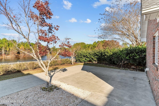 view of patio / terrace with a water view