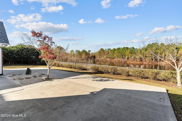 exterior space with a water view