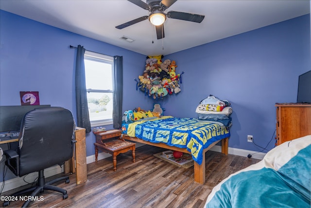 bedroom featuring ceiling fan and dark hardwood / wood-style flooring