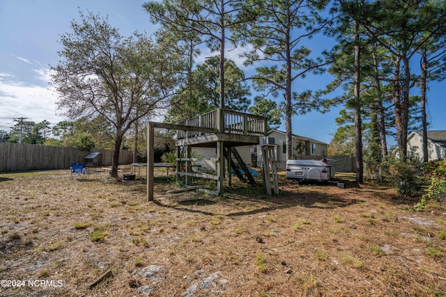 back of property featuring a wooden deck