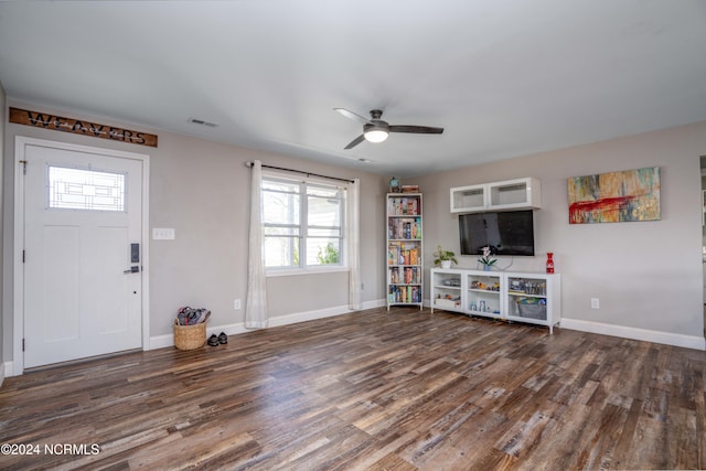 foyer featuring ceiling fan and dark hardwood / wood-style flooring