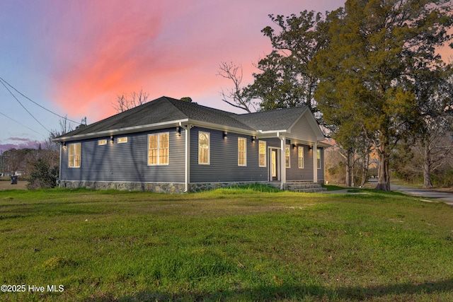 view of front of house with a front lawn