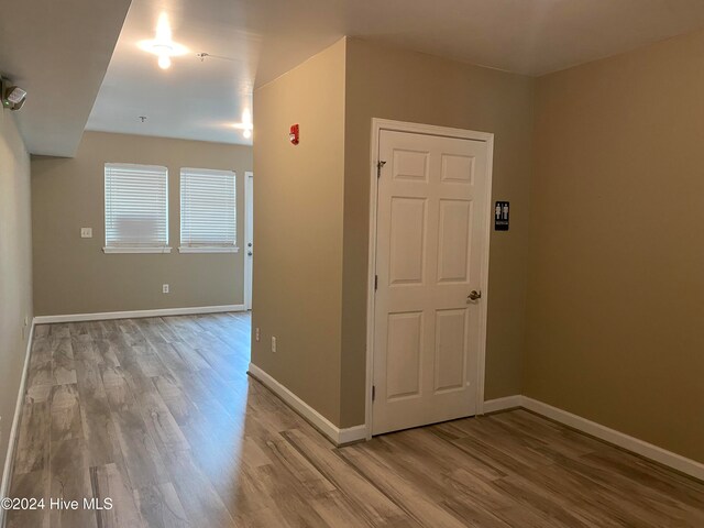 spare room featuring light hardwood / wood-style flooring