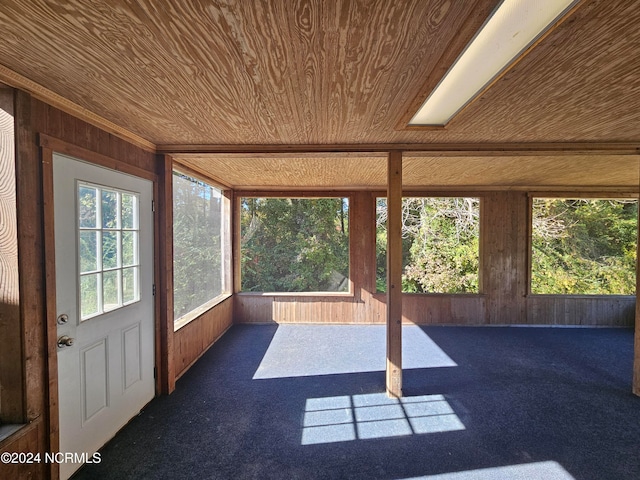 unfurnished sunroom featuring wooden ceiling