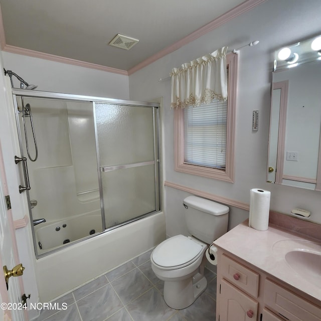 full bathroom with combined bath / shower with glass door, toilet, tile patterned floors, vanity, and crown molding