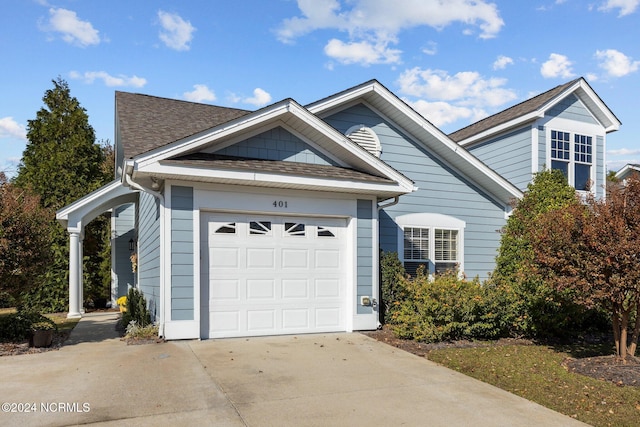 view of front of property with a garage