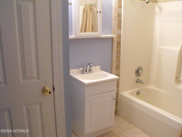 bathroom with vanity, tile patterned floors, and tub / shower combination