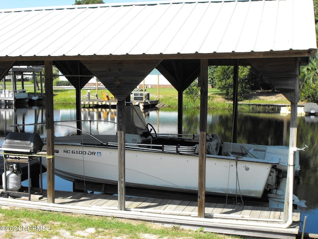 view of dock with a water view