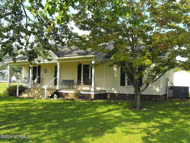 bungalow-style house featuring a porch and a front yard