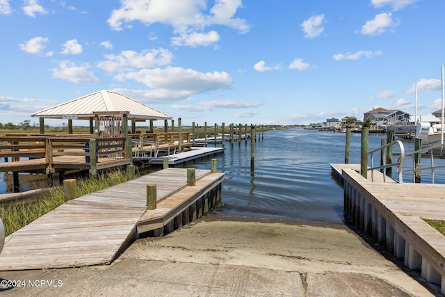 dock area with a water view