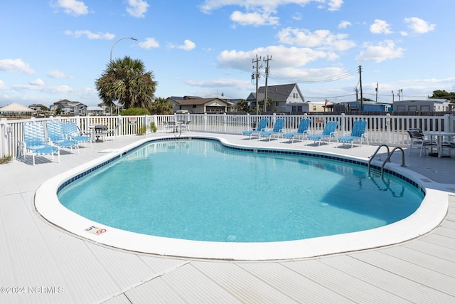 view of pool with a patio area