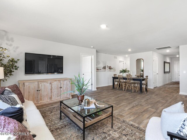 living room with hardwood / wood-style flooring