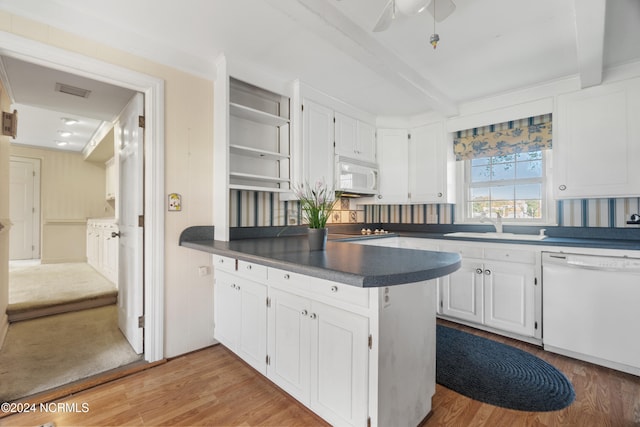 kitchen with kitchen peninsula, white cabinetry, light wood-type flooring, and white appliances