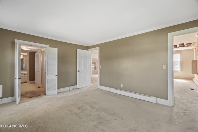 unfurnished bedroom featuring crown molding, baseboard heating, and light colored carpet