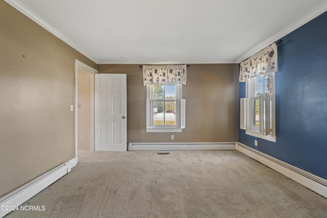 unfurnished room featuring ornamental molding, a baseboard heating unit, and carpet flooring