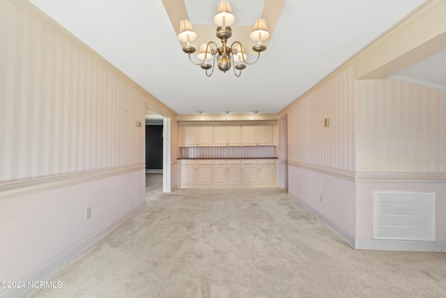 interior space with a notable chandelier, crown molding, and light carpet