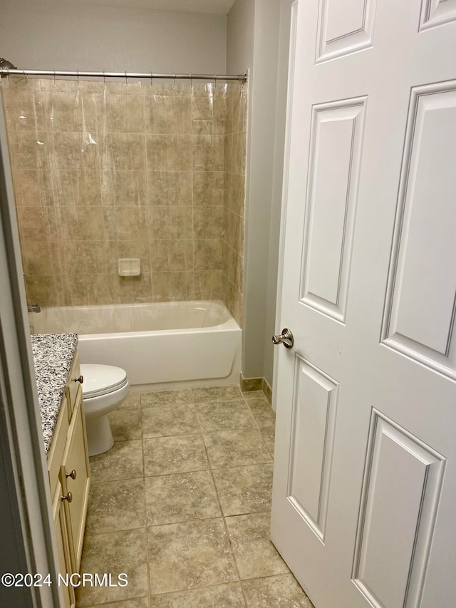 full bathroom featuring vanity, toilet, and tiled shower / bath combo