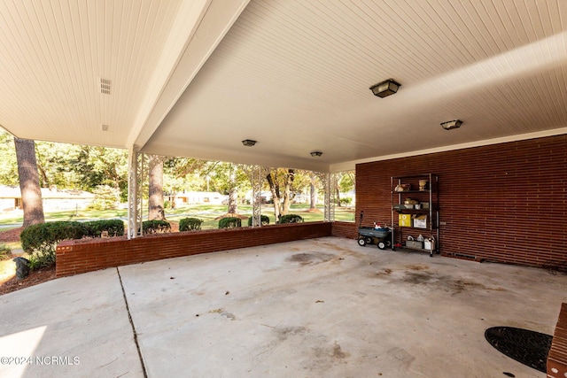 view of patio / terrace featuring an attached carport