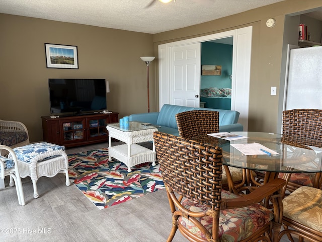 3307 Ocean Dr Unit 2, Emerald Isle, NC 28594 - living area featuring wood finished floors and a textured ceiling