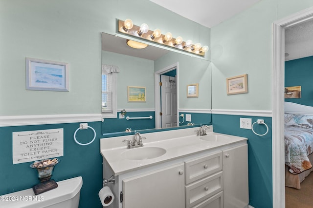 3307 Ocean Dr Unit 2, Emerald Isle, NC 28594 - ensuite bathroom with double vanity and toilet