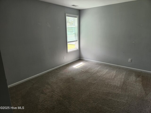 unfurnished bedroom with a closet and carpet flooring