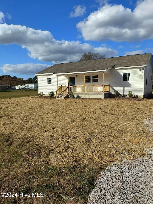 view of front of home with a wooden deck