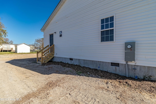 rear view of house featuring a porch and central AC unit