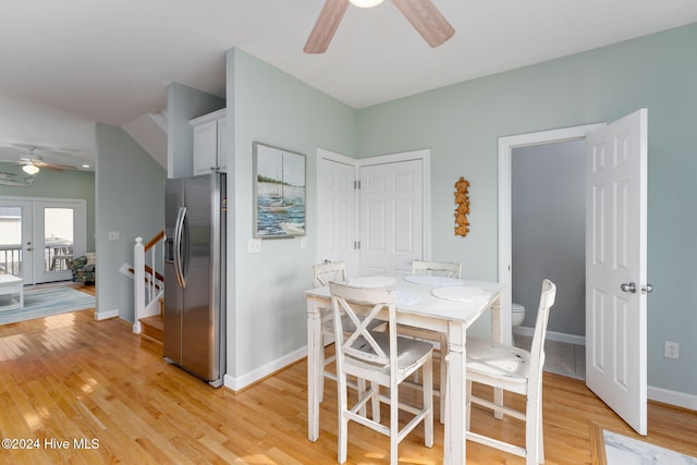 dining space featuring light hardwood / wood-style floors and ceiling fan