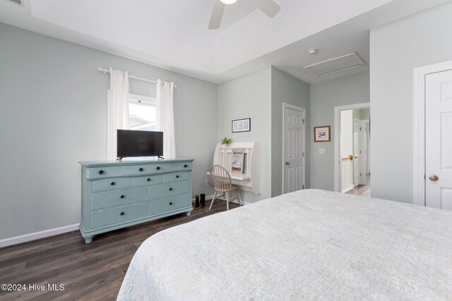 bedroom featuring dark wood-type flooring and ceiling fan