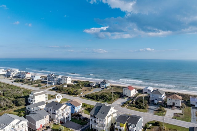 drone / aerial view with a view of the beach and a water view