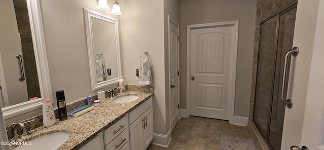 bathroom with walk in shower and vanity