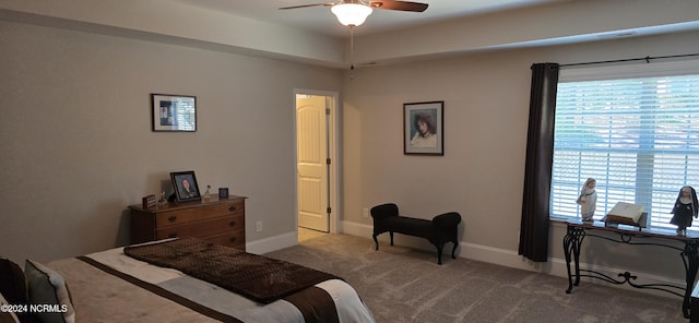 bedroom featuring ceiling fan and light colored carpet