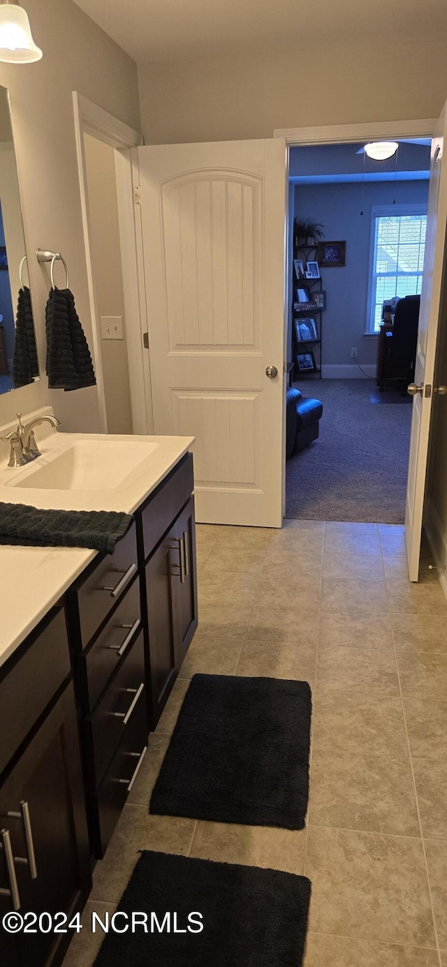 bathroom with vanity and tile patterned flooring